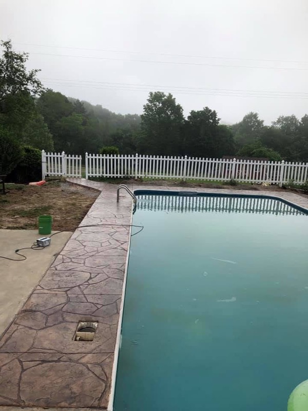 Stamped concrete pool deck surround